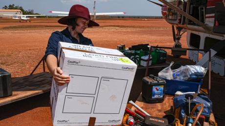 MAF Reservations Officer loading an aeroplane.