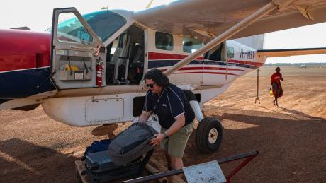 MAF staff unloading aircraft 