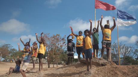 Students waving farewell 