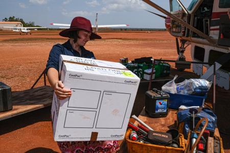 MAF Reservations Officer loading an aeroplane.