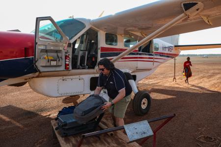 MAF staff unloading aircraft 