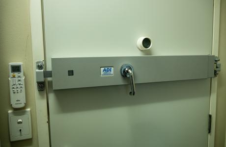 Steel bar and lock on door