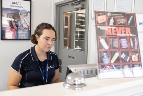 Resrvations officer at ticketing counter