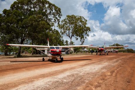 MAF planes on ground at airstrip