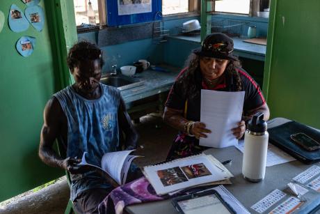 ALPA worker and client sitting at desk