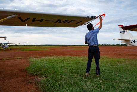 Pilot in pre-flight check