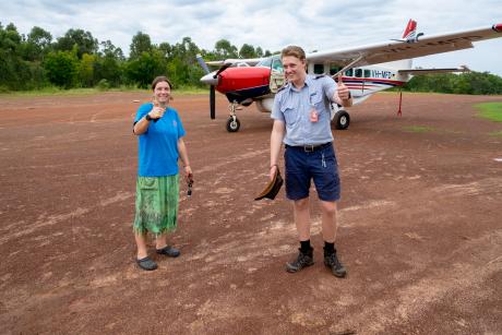 Teacher and pilot with thumbs-up to camera