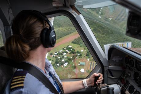 Pilot looking down on homeland houses