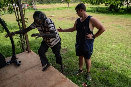 Physiotherapist and patient work on strength routine