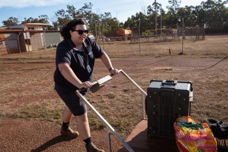 Staff wheeling trolley