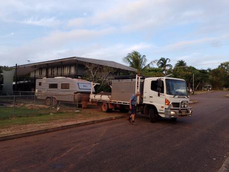 Truck and caravan backing into driveway