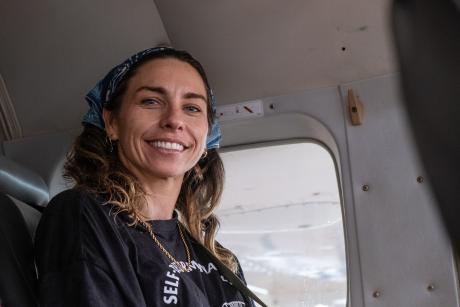 Woman sitting in aircraft